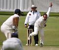 Ryan opens the bowling for Forfarshire.jpg